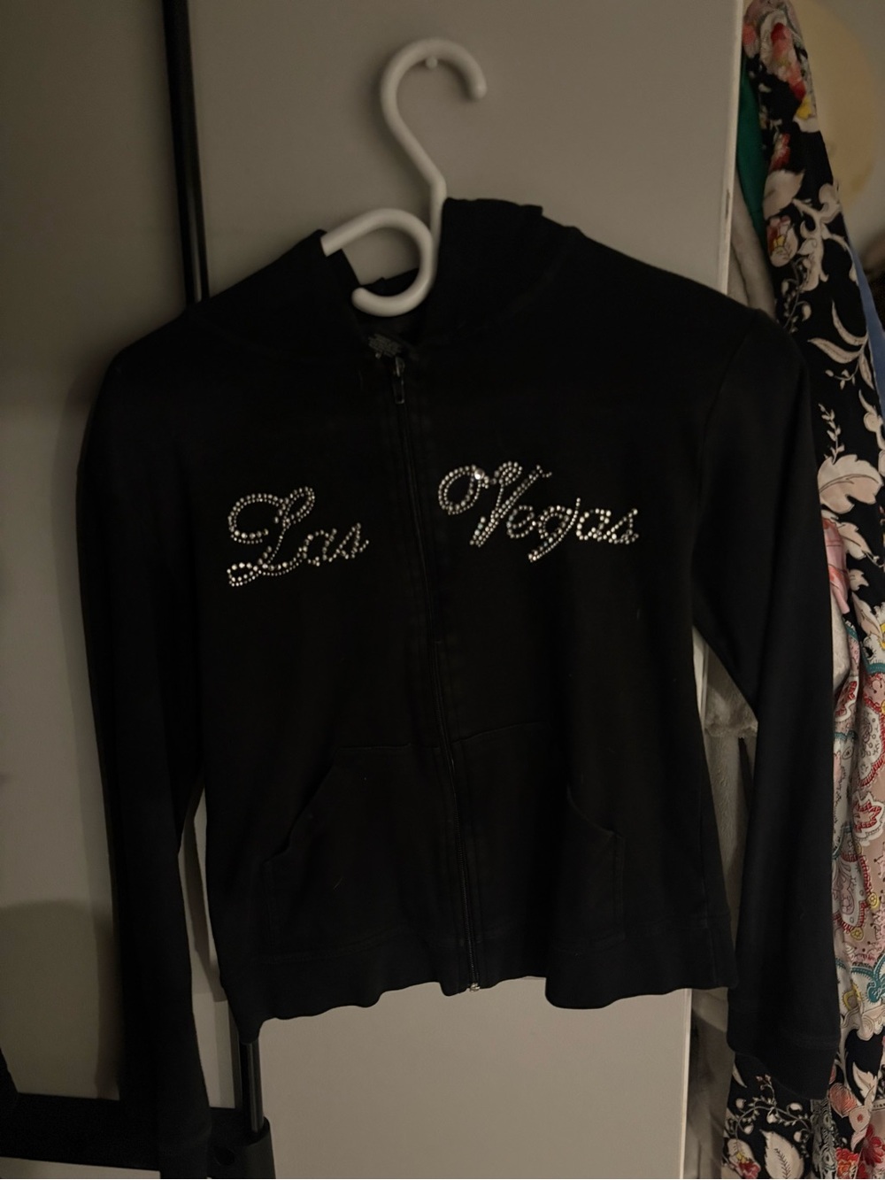 Y2K-style black zip-up hoodie